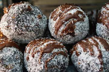 Delicious mixed muffins with apricot walnut topping bran muffin in a white paper tray freshly baked Europe savory 