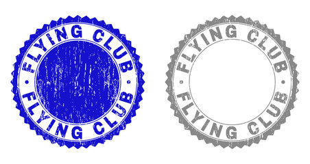 Grunge FLYING CLUB stamp seals isolated on a white background. Rosette seals with grunge texture in blue and grey colors. Vector rubber stamp imprint of FLYING CLUB tag inside round rosette.