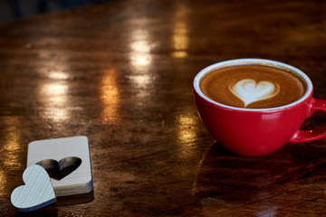 Cup of coffee latte in coffee shop