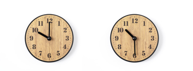 wood office wall clock with white dial on white background. wall clock on white background, top view.