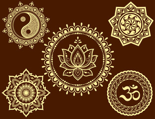 Set of circular patterns in form of Mandala with religious symbols. Oriental signs OM, Yin-Yang, lotus flower, sun for Henna, Mehndi, tattoo, decoration. Decorative ornament in ethnic style.