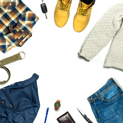 Flat lay set Men's casual clothing, jacket jeans checkered shirt knitted sweater yellow nubuck shoes strap wrist watch wallet car keys isolated items on white background top view. Male fashion