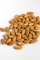 Obraz premium handful of almonds on white background