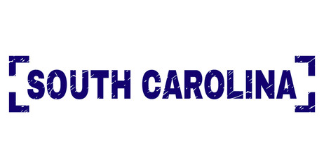 SOUTH CAROLINA text seal print with corroded effect. Text tag is placed inside corners. Blue vector rubber print of SOUTH CAROLINA with dust texture.