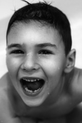 laughing boy close up.