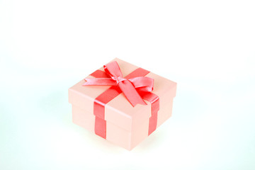 gift box with red bow and white background