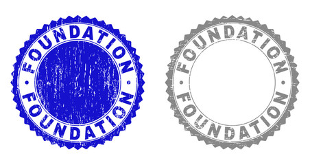 Grunge FOUNDATION stamp seals isolated on a white background. Rosette seals with grunge texture in blue and grey colors. Vector rubber stamp imprint of FOUNDATION title inside round rosette.