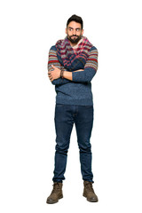 Naklejka premium Full-length shot of Hippie man making doubts gesture while lifting the shoulders on isolated white background