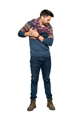 Fototapeta premium Full-length shot of Hippie man having a pain in the heart on isolated white background