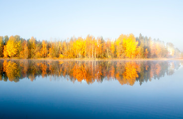 Beautiful autumn morning landscape of Kymijoki river waters in fog. Finland, Kymenlaakso, Kouvola.