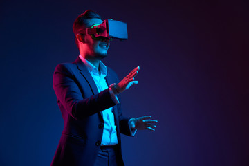 Businessman conducting meeting in vr glasses - Powered by Adobe