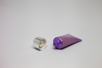 purple open tube cream