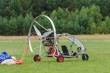 PARGLITER - A light recreational machine stands at the airport