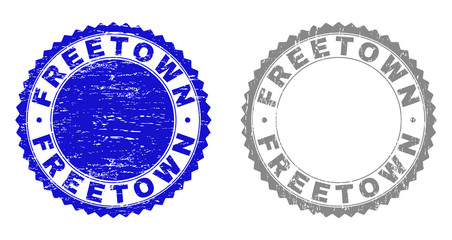 Grunge FREETOWN stamp seals isolated on a white background. Rosette seals with grunge texture in blue and gray colors. Vector rubber watermark of FREETOWN caption inside round rosette.