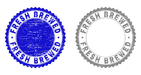 Grunge FRESH BREWED stamp seals isolated on a white background. Rosette seals with grunge texture in blue and grey colors. Vector rubber stamp imprint of FRESH BREWED text inside round rosette.