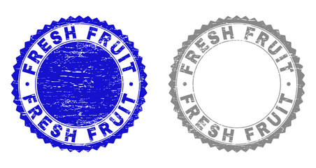 Grunge FRESH FRUIT stamp seals isolated on a white background. Rosette seals with grunge texture in blue and gray colors. Vector rubber stamp imprint of FRESH FRUIT text inside round rosette.