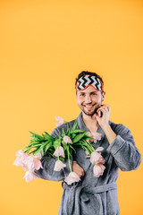 bouquet of tulips in hand on white background close-up. Concept 8 March, international women's day. Valentine's Day. Smart young man at Valentine's day. Concepts. Love - Image