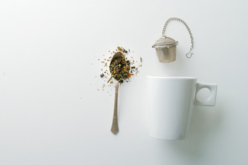 concept of drinking tea without plastic single use teabag. reusable  metalic infuser - obrazy, fototapety, plakaty