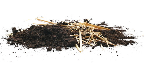 Soil, dirt pile with straws isolated on white background