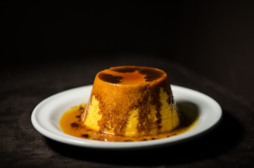Flan, a latin american, european delicacy. a great dessert. is a type of egg custard that came to Latin America via Spain. It usually is covered by melted caramel.