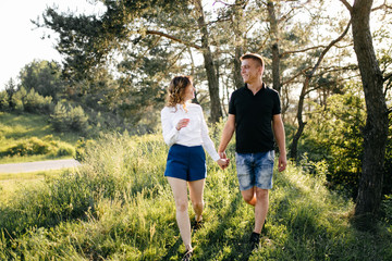 Portrait of a happy young couple enjoying a day in the park together