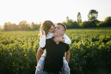 Portrait of a happy young couple enjoying a day in the park together