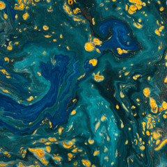 Fototapeta na wymiar Abstract paint texture art. Natural luxury. Blue paint with gold glitter powder. Marble background.