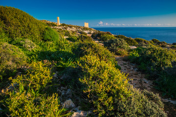 Fototapeta na wymiar Summer vacation by the Mediterranean Sea, Blue water, Watchtower in background