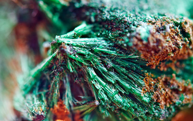 Green beautiful background of natural mineral Malachite. Macro