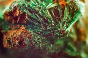 Green beautiful background of natural mineral Malachite. Macro