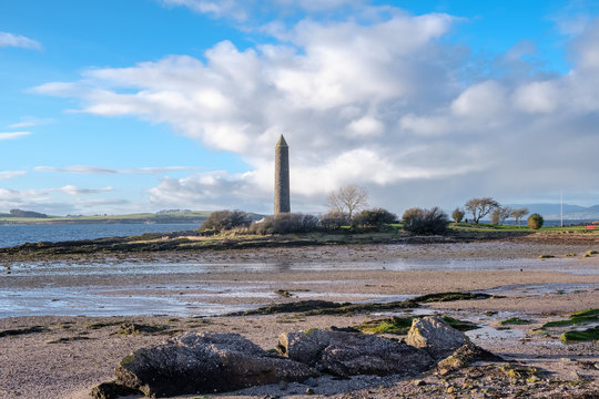 Largs Foreshore And The Pencil Monument Commemorating The Viking Battle Of Largs In 1263.