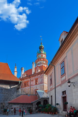 Fototapeta premium Beautiful sunset over historic centre of Chesky Krumlov old town in the South Bohemian Region of the Czech Republic on Vltava River. UNESCO World Heritage Site