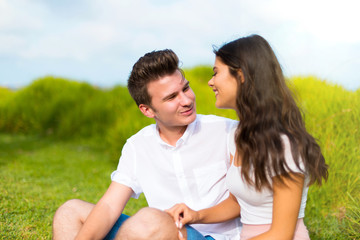 Happy young couple at outdoors