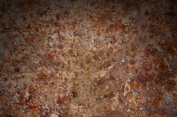 Corroded and rusty surface lit from above