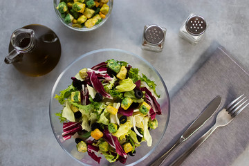 Salad of mix leaves with croutons and olive oil. Concept vngetarianism.