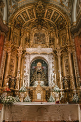 Fototapeta na wymiar SEVILLA, SPAIN. NOVEMBER, 26 - 2018: Altar of Basilica de la Macarena in Seville, Andalusia.
