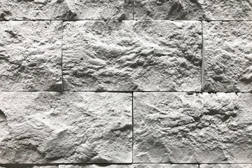 Stone wall with a grey color. Concept interior design background and texture