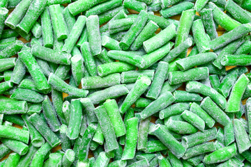 frozen chopped bright green beans, flat lay, background, texture