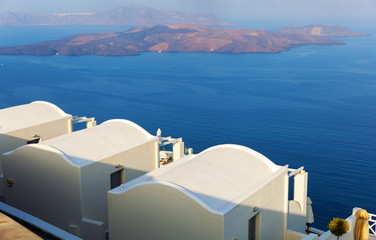 Oia town on Santorini island, Greece. Caldera on Aegean sea.