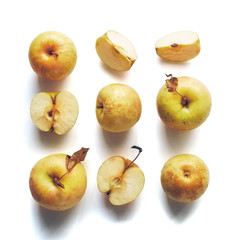 Fresh yellow apples Golden on a white background.  Autumn  the composition. Isolated objects.Top view. Minimal concept.
