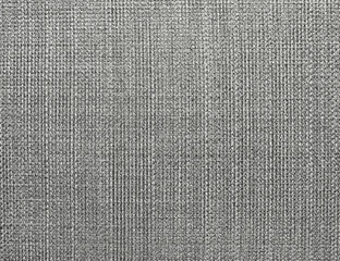 The textured gray natural fabric . 
