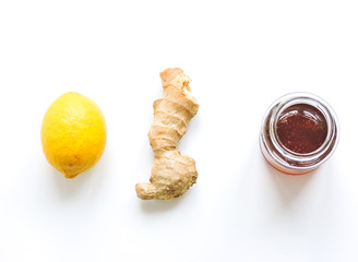 Lemons and ginger on a white background.Healthy food. Ginger Root Tea with Lemon. Healthy...