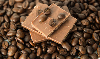 coffee,chocolate,beans,background,spices,anise,cinnamon,sweet,food,brown,nut,dessert,gourmet,almonds,spice,sugar,wooden,tasty,broken,white,cocoa,closeup,delicious,black,orange,isolated,close,snack,mil