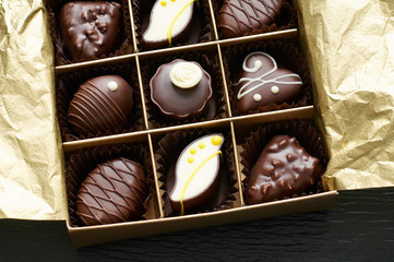 Artisan handcrafted chocolate bonbons packaged in a gift box