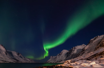Obraz premium Amazing Aurora Borealis in North Norway (Kvaloya), mountains in the background