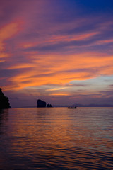 Krabi Thailand ocean sunset with boat