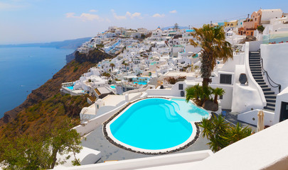 Sunny morning view of Santorini island. Famous Greek resort Oia, Greece, Europe. Traveling concept...