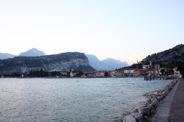 Evening walk. Picturesque lake Garda
