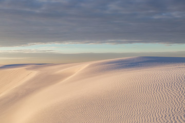 Fototapeta na wymiar An early morning view looking across the sand dunes, at White Sands National Monument, New Mexico