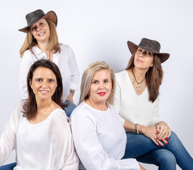 Fun of four friends in a photographic studio